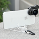 The keychain attachment can turn into a handy little stand.